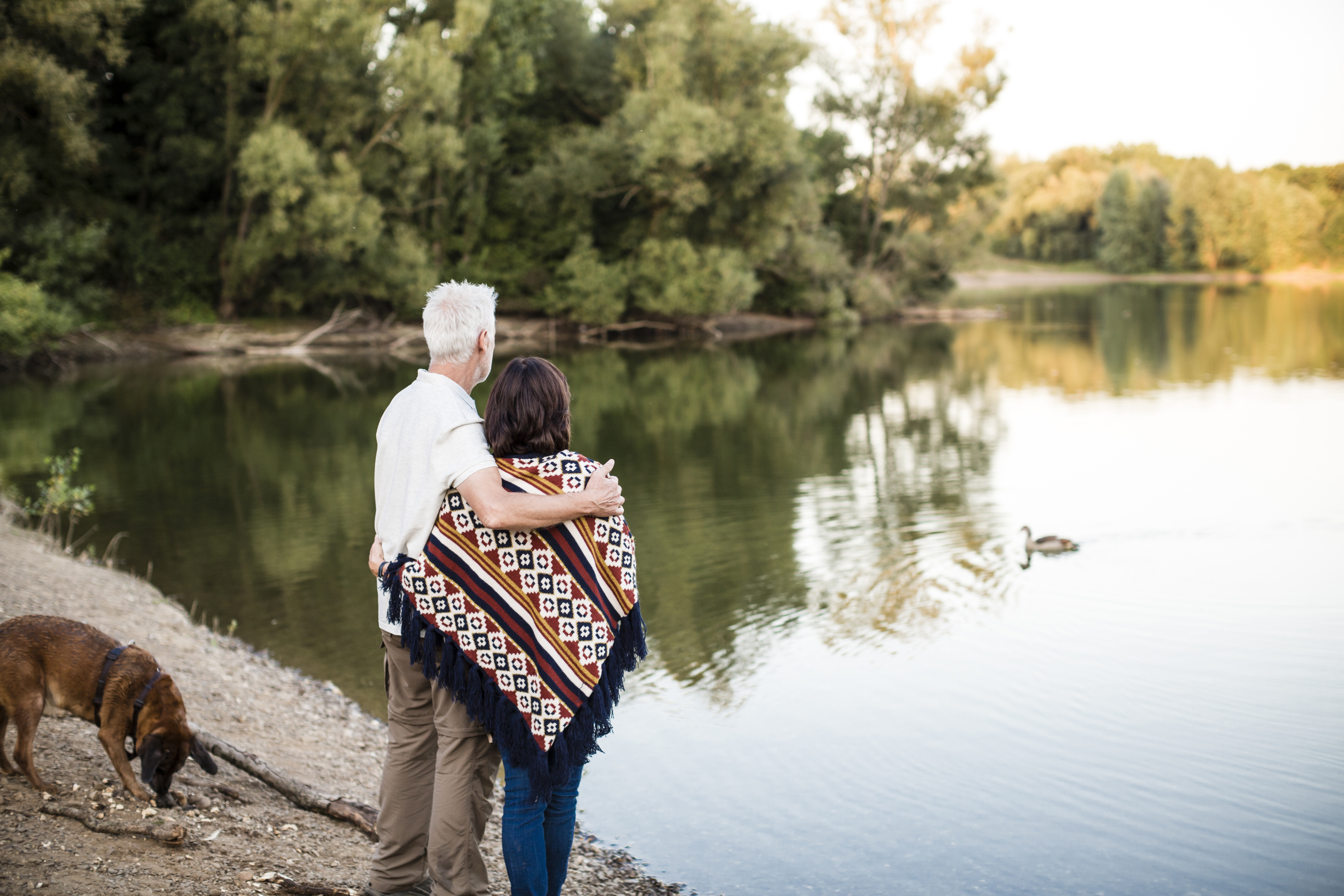 Couple looking at a lake in Tennessee, one of the best states to retire in the U.S.